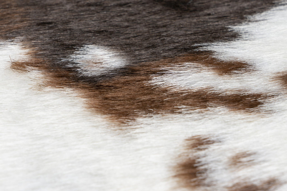 Rodeo 201 — Koeprint · Zachtpolig vloerkleed